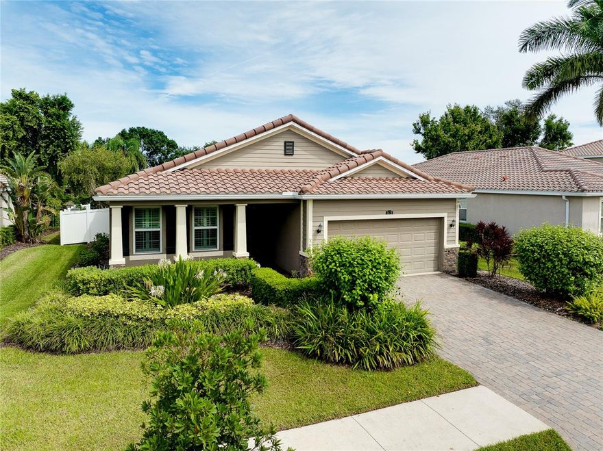 Tucked away on a quiet cul-de-sac in a newer gated community in the  Palmer Ranch area, this tranquil and well-appointed home offers the perfect blend of comfort and convenience.  Featuring 3 bedrooms, 2 baths, plus a den, the open split-bedroom floorplan is designed for both everyday living and entertaining.  The spacious kitchen boasts upgraded 42" cabinetry, granite countertops, and a breakfast bar that seamlessly connects to the living and dining areas, while the den offers a private retreat tucked off to the side.  Tile flooring flows through the main living spaces, with low-maintenance laminate in the bedrooms.  Step outside to your private patio overlooking a serene pond, where you can relax and enjoy the abundance of birds and wildlife from your fully fenced backyard haven.  This home is equipped with numerous upgrades, including a high-efficiency 15 SEER HVAC system, programmable thermostat, radiant roof barrier sheathing, and energy-saving double-pane low-E windows and sliding glass door and hurricane shutters for peace of mind.  If it is a pool you desire, there is room for one here (sketch attached).   This upscale community of 49 homes showcases timeless curb appeal, with each home featuring brick paver driveways and entry walks, elegant stone exterior accents, and durable barrel tile cement roofs.  The low HOA fee includes gated entry, grounds maintenance, lawn irrigation, and access to the community playground.  Ideally located near I-75, this community is just minutes from world-famous Siesta Key, vibrant downtown Sarasota, and an array of shops, dining, parks, and trails, some just a couple blocks away.  Top-rated schools are also nearby, making this home an exceptional choice.    Up to 1% of the loan amount for rate buy down or lender credits are being offered specifically for this home