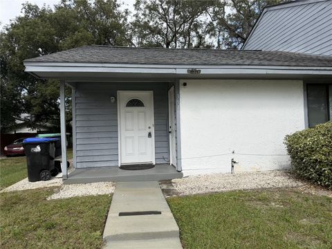 Photo of 3919 Magnolia Pointe Lane, Orlando, FL 32810 (MLS # O6354071)