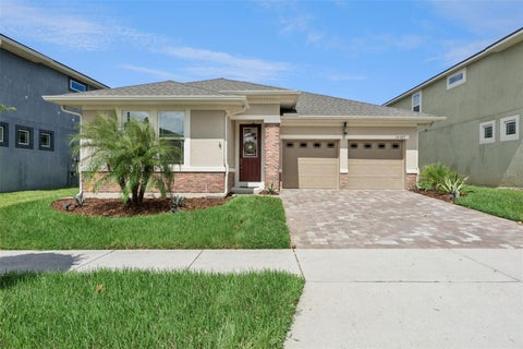 Photo of 16387 Taliesin Street, Winter Garden, FL 34787 (MLS # O6445800)