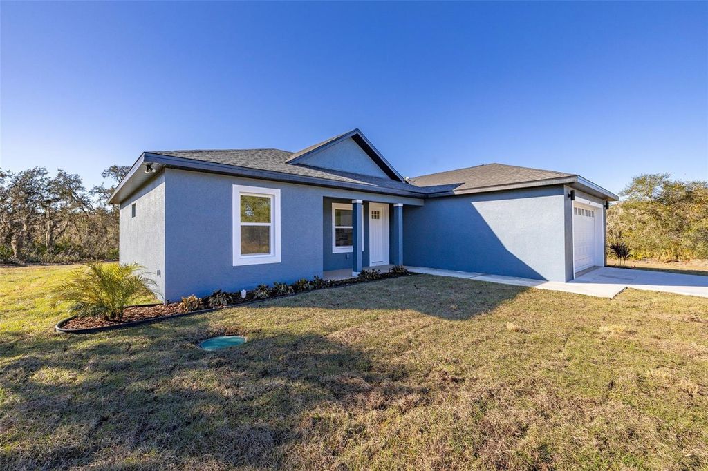 Photo of 3021 W Kenosha Road, Avon Park, FL 33825 (MLS # S5142178)