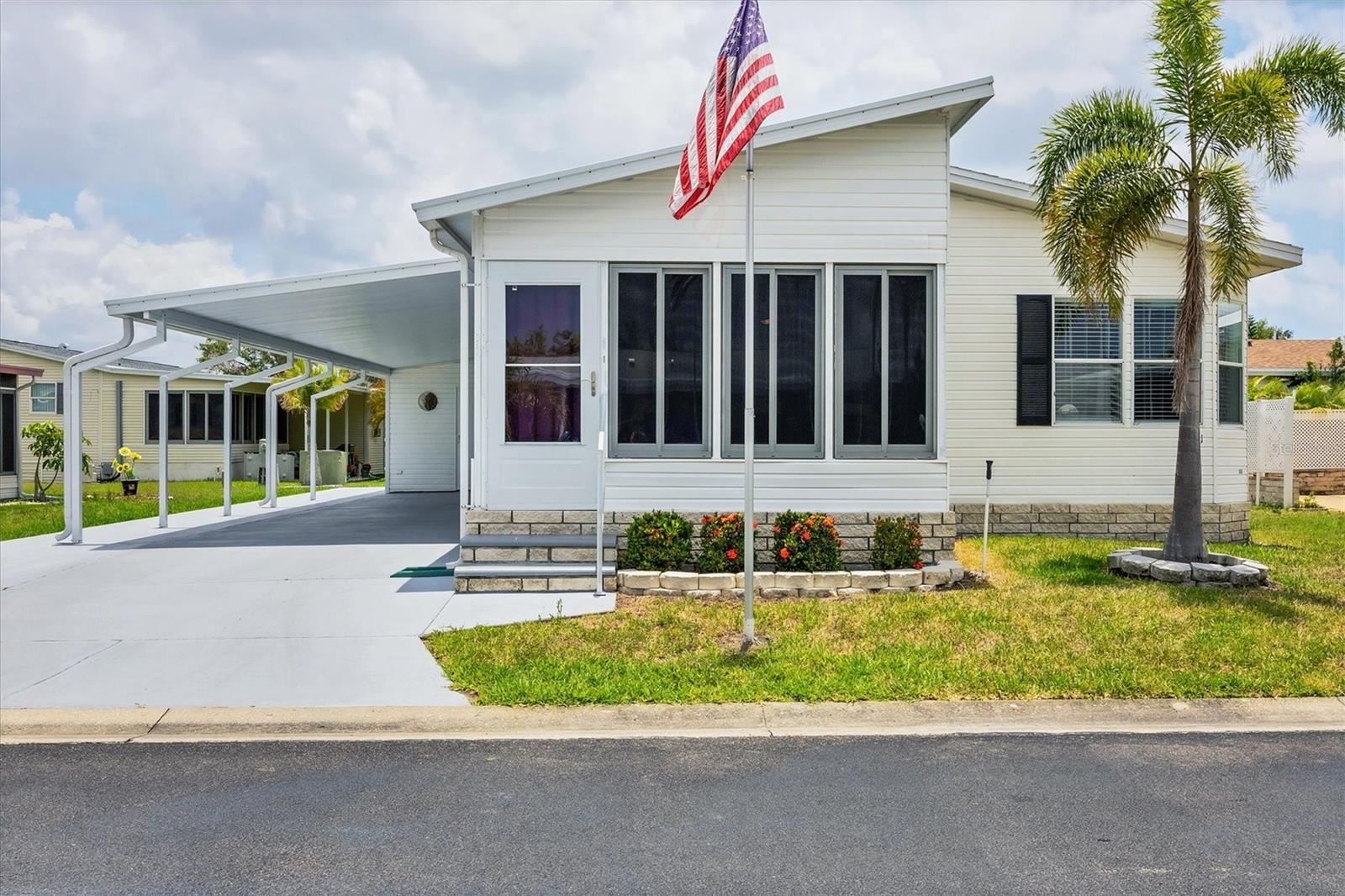Updated & Affordable Florida Home in Gated 55+ Community – NO Lot Rent!
Welcome to Gold Tree Co-Op, one of Bradenton’s most desirable resident-owned 55+ gated communities—where you own your land share, enjoy low monthly fees, and live a worry-free, active lifestyle!
This beautifully updated 2-bedroom, 2-bath double-wide is move-in ready and full of value. Inside, you’ll find a bright, open layout with 2024 luxury vinyl plank flooring, newer stainless steel appliances, and a 2021 roof for added peace of mind. The spacious kitchen features ample cabinet space and a clean, modern feel.
Relax year-round in your enclosed, air-conditioned Florida room—perfect for an office, art studio, or reading nook. Large windows fill the home with natural light. You’ll also enjoy an indoor laundry room, extended carport, and a private outdoor storage area.
Gold Tree Co-Op offers resort-style amenities including a heated pool and spa, pickleball and tennis courts, shuffleboard, bocce ball, a fitness center, clubhouse, and a full calendar of social events. With on-site management and maintenance, your focus stays on enjoying life—not yardwork.
Convenient to shopping, dining, I-75, and just a short drive to the world-renowned Gulf beaches.
Don’t miss this rare opportunity to own in Gold Tree—schedule your private showing today!