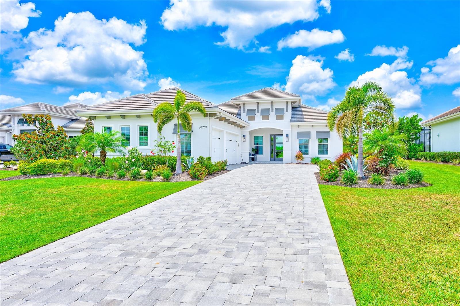 Under contract-accepting backup offers. Luxury, Privacy, and Prestige — Welcome to The Lake Club
Welcome to The Lake Club—Lakewood Ranch’s most exclusive, guard-gated community.
Situated on one of the most private and desirable cul-de-sac lots in the neighborhood, this 2021 custom-built estate offers Florida luxury living at its finest. With no rear neighbors and lush landscaping behind the lanai, you'll enjoy unmatched peace and seclusion.
Inside, you’ll find 4 spacious bedrooms, a dedicated home office, 3.5 elegant bathrooms, and a chef’s kitchen outfitted with premium appliances and finishes. The climate-controlled 3-car garage adds year-round comfort.
Upgrades abound: luxury heated pool and spa, motorized lanai shade, outdoor kitchen, custom built-ins, designer lighting, and high-end window treatments throughout.
Live the lifestyle you deserve in The Lake Club—with resort-style amenities including a grand clubhouse, fitness center, tennis courts, and more. Refined living. Exceptional value.
Don’t miss this rare opportunity.