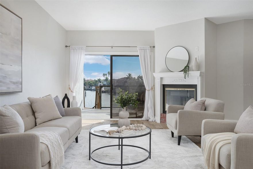 All Assessments Paid. Brand New Metal Roof (2025). Fully Remodeled Interior (2023). 2 Deeded Parking Spots. (One Covered and Conveniently located Steps away from the front Door.) One,  12x33 Deeded Boat Slip. Experience the Most Laid Back Community in all of Tierra Verde. Experience Waterfront Living at Its Finest in Tierra Verde
Imagine Waking Up To Your Canal, Having Coffee and Watching Dolphins. Maybe you find Peace By Being on the Water. Invite Your  Family Over for a Day of Fishing and Swimming in the Olympic Swimming Pool. Because every morning in this beautifully updated 3-bedroom, 2-bathroom condo, Your Dream is a Reality.
Spanning over 2,300 square feet of climate-controlled luxury, this residence combines comfort with elegance, presenting a rare opportunity in an exclusive community of only 33 units—where half live full time.  Making living here, full or part time a true getaway.
Enjoy the lush landscaping adorned with birds of paradise. As you enter the inviting living room, which boasts stunning water views with one of two cozy wood-burning fireplaces, setting the perfect ambiance for relaxation. Step outside to the main level balcony, where a spiral staircase leads you down to your outdoor living area with outside Furniture and a New Composite Deck. Perfect for Yoga with Friends. The Canal offers direct access to the Gulf of Mexico where the world Comes To Fish. Dont get me started on the convenient location of the world-class Fort De Soto State Park.  The Location Alone is worth the Price of this Unit and You Have To See North Beach to Believe me. 
The Fully Renovated Kitchen Is A Culinary Delight, Featuring An Oversized Island, Stainless Steel Appliances, Exquisite Stone Countertops, and High-Quality Cabinets. The adjoining dining area continues the water view, making every meal a memorable occasion.
On the main floor, you'll find a full-size washer and dryer, a conveniently located common bath, and two spacious bedrooms, each equipped with ample closet space. Ascend the beautifully remodeled staircase to discover a versatile bonus room behind elegant barn doors, perfect for a home office, playroom, or personal gym. This room also provides access to a generous climate-controlled storage area.
Retreat to the primary bedroom, where you can catch the most serene sunrise over your water views own your private balcony. Bask in the warmth of another fireplace and enjoy a sizable, cedar-lined closet measuring 7x10. The semi-private vanity area features dual sinks, providing an ideal setting for your morning routines, complemented by a stylish private bath with a shower, accessed through a new barn door.