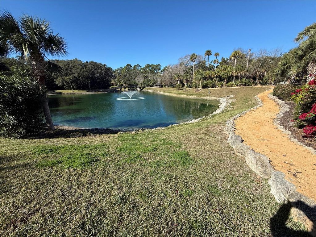 Photo of 200 Canopy Walk Ln #242, Palm Coast, FL 32137 (MLS # FC314977)