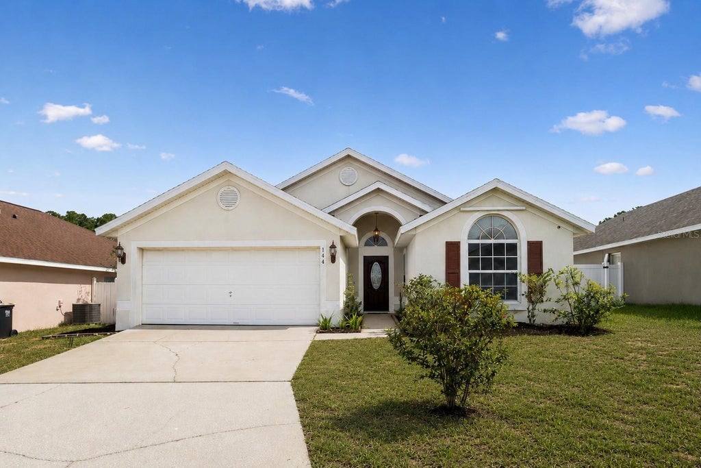 Photo of 144 Bellmont Lane, Davenport, FL 33897 (MLS # O6417798)