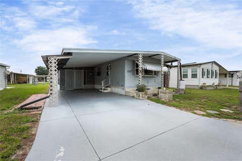 Photo of 5318 Astrid Drive, Zephyrhills, FL 33541 (MLS # TB8533151)