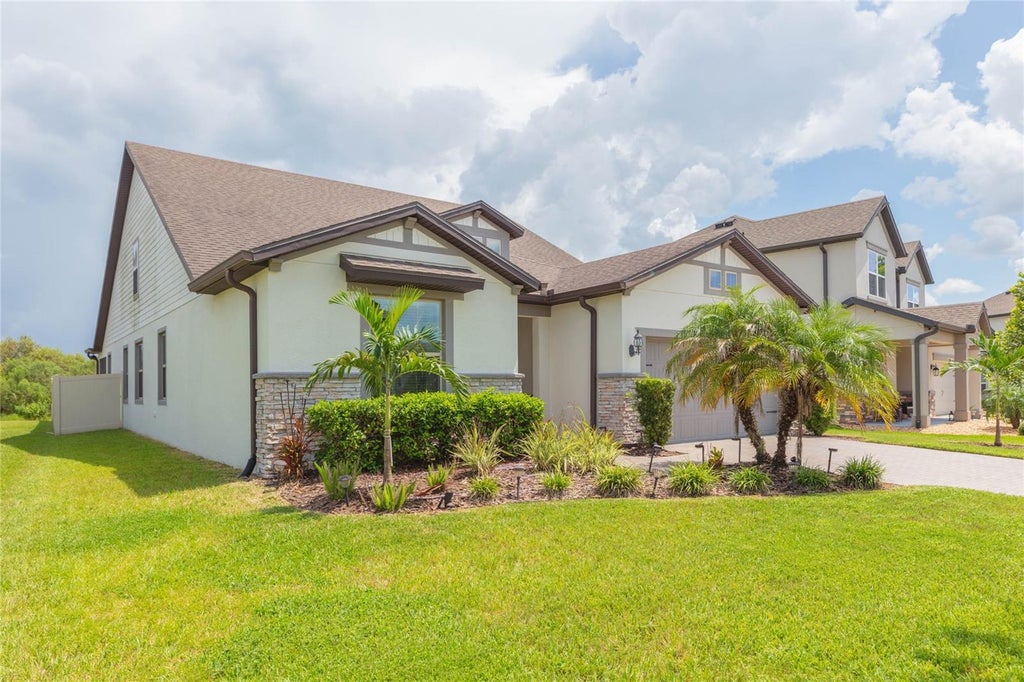Photo of 7430 Pool Compass Loop, Wesley Chapel, FL 33545 (MLS # TB8536111)