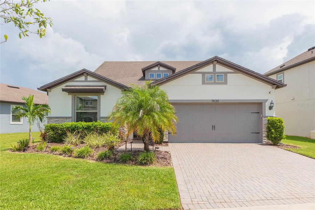 Photo of 7430 Pool Compass Loop, Wesley Chapel, FL 33545 (MLS # TB8536111)