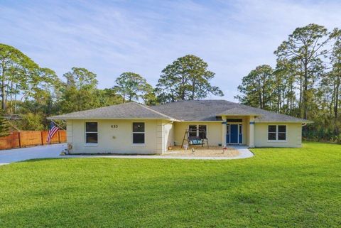 Photo of 633 Art Center Avenue, New Smyrna Beach, FL 32168 (MLS # FC316711)