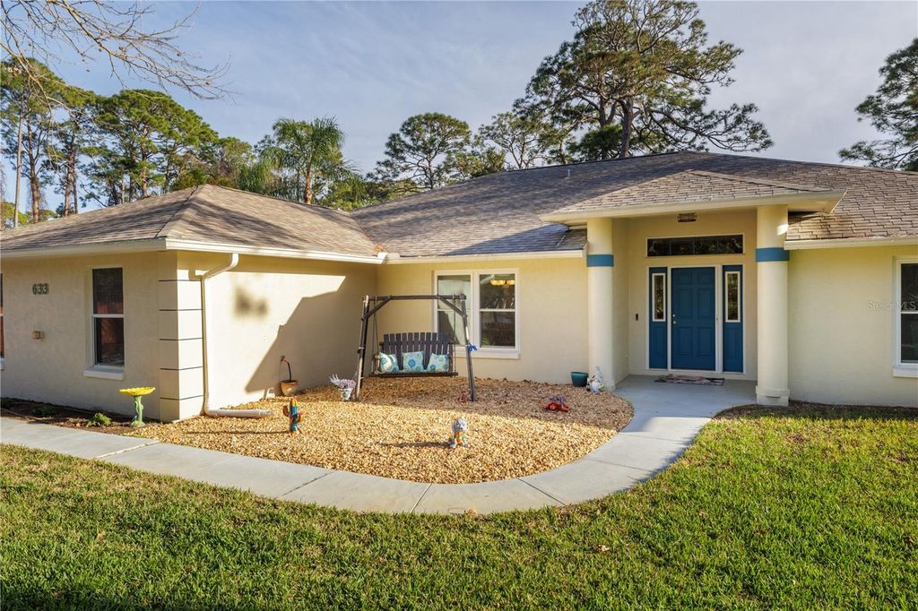 Photo of 633 Art Center Avenue, New Smyrna Beach, FL 32168 (MLS # FC316711)