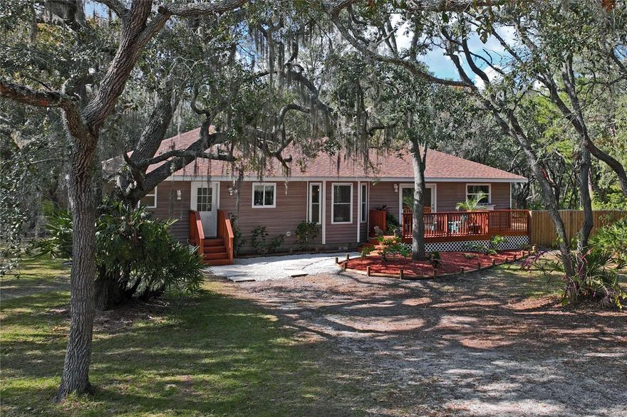 BEAUTIFUL 3-BEDROOM HOME ON 1.7 ACRES — PLUS A  2,720 SQ. FT. GARAGE/WORKSHOP

Welcome to this spacious and charming 3-bedroom, 2-bath home, featuring a versatile extra room perfect for an office, craft space, or hobby area. Boasting 1,948 sq. ft. of comfortable living, this home is set on 1.70 acres of serene, park-like land, offering the tranquility of country living while remaining conveniently close to shopping, dining, and everyday amenities.

Step inside to a bright, open split floor plan designed for comfort and functionality. Beautiful laminate flooring extends throughout most of the home.  The well-appointed kitchen with GE appliances is perfect for cooking and entertaining, and spacious living areas provide plenty of room for family and friends to gather.

Outside, this property truly stands out with a 2,720 sq. ft. garage/workshop, ideal for car enthusiasts, storage, or large projects. A shed behind the home adds additional convenience. With 1.7 acres of land, there’s plenty of room to garden, expand, or simply enjoy the peaceful outdoors.

Additional highlights include a 2023 roof replacement, no HOA 0r CDD and X flood zone compliance, giving you added peace of mind.

This home offers the perfect combination of space, privacy, and practicality, a true country retreat with everything you need within reach.