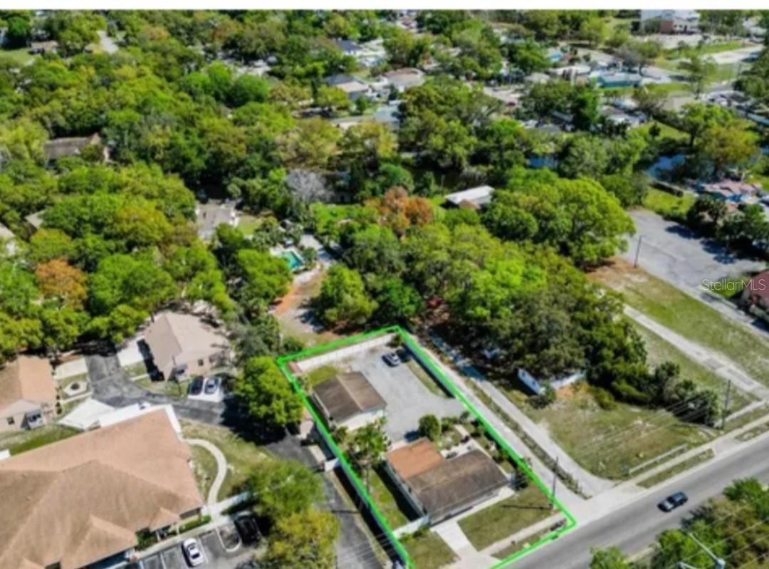 Perfect opportunity for your small business. Great for medical, Day care, offices, or use as two Air B&Bs. Both structures are completely remodeled. The main structure has 1286 SF . Second structure has 513SF plus storage room. High traffic area close to Hillsborough and Memorial Highway. Lot is 100x169. Property would need rezoning. Presently zoned residential. Zoning is predominantly commercial in the area. Ample parking along side with vinyl fencing surrounding property.
