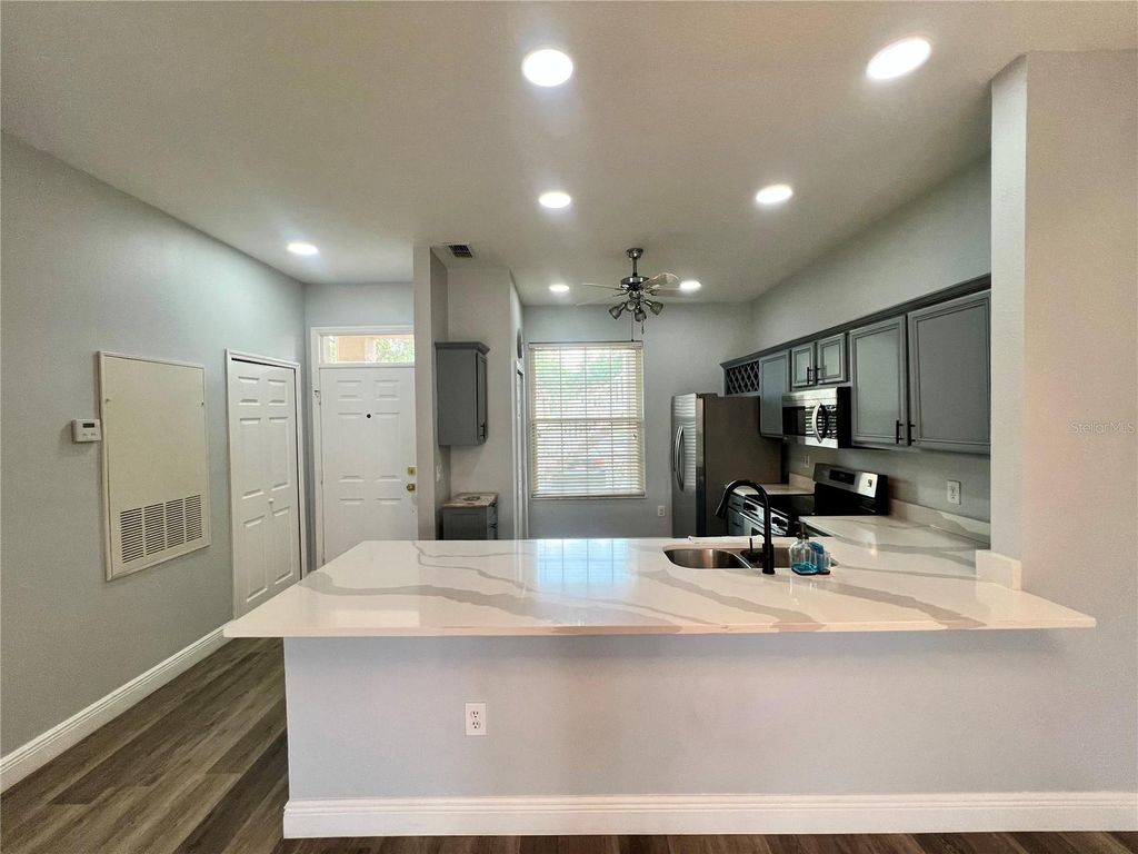 Photo of 2856 Osprey Cove Place #104, Kissimmee, FL 34746 (MLS # O6402596)