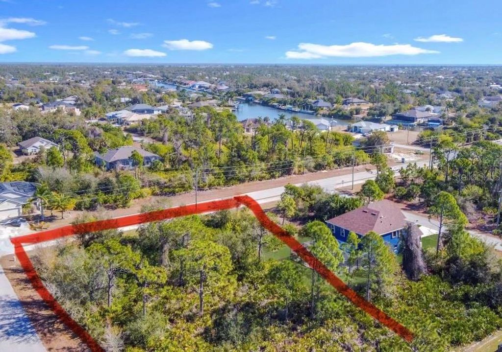 Photo of 9211 Canna Street, Port Charlotte, FL 33981 (MLS # A4684406)