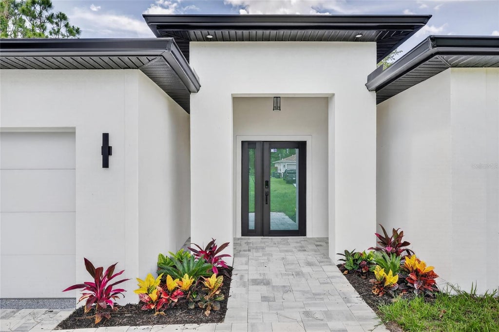 Photo of 7841 Sontag Avenue, North Port, FL 34291 (MLS # C7526657)