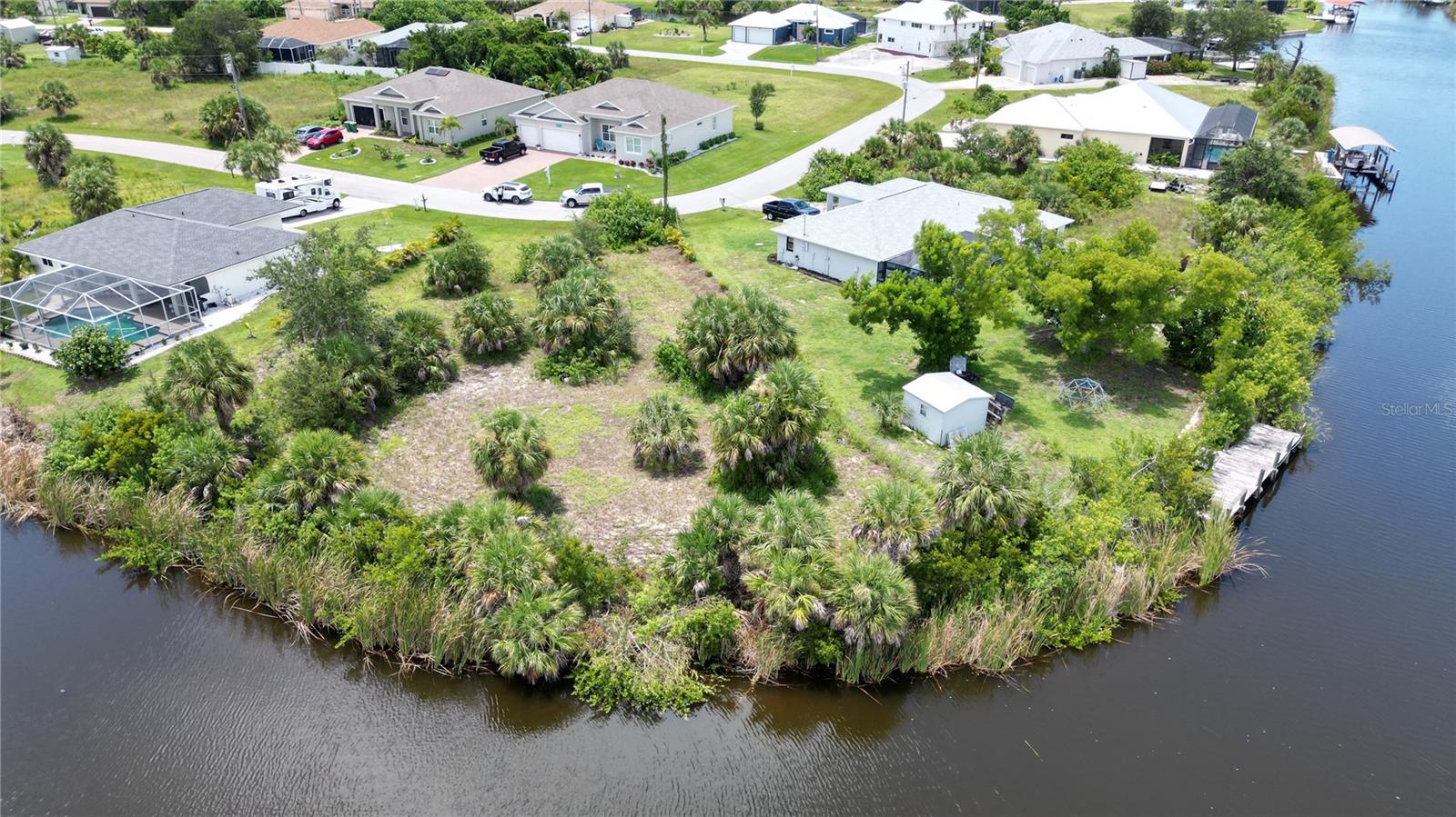 WATERFRONT TIP lot in sought after waterfront community of South Gulf Cove. View of intersecting Canals from your 162' of waterfront, just WOW!! You'll find a Public boat ramp also in the community as well a parks, walking/jogging paths along the Interceptor lagoon, sidewalks in many areas too. You are an appx 15 minute drive to Gulf Beaches of Englewood and multiple golf courses as well Why not live where you want to play? Take a drive by today and see for yourself this beautiful TIP lot where you will want to build the home of your dreams!!