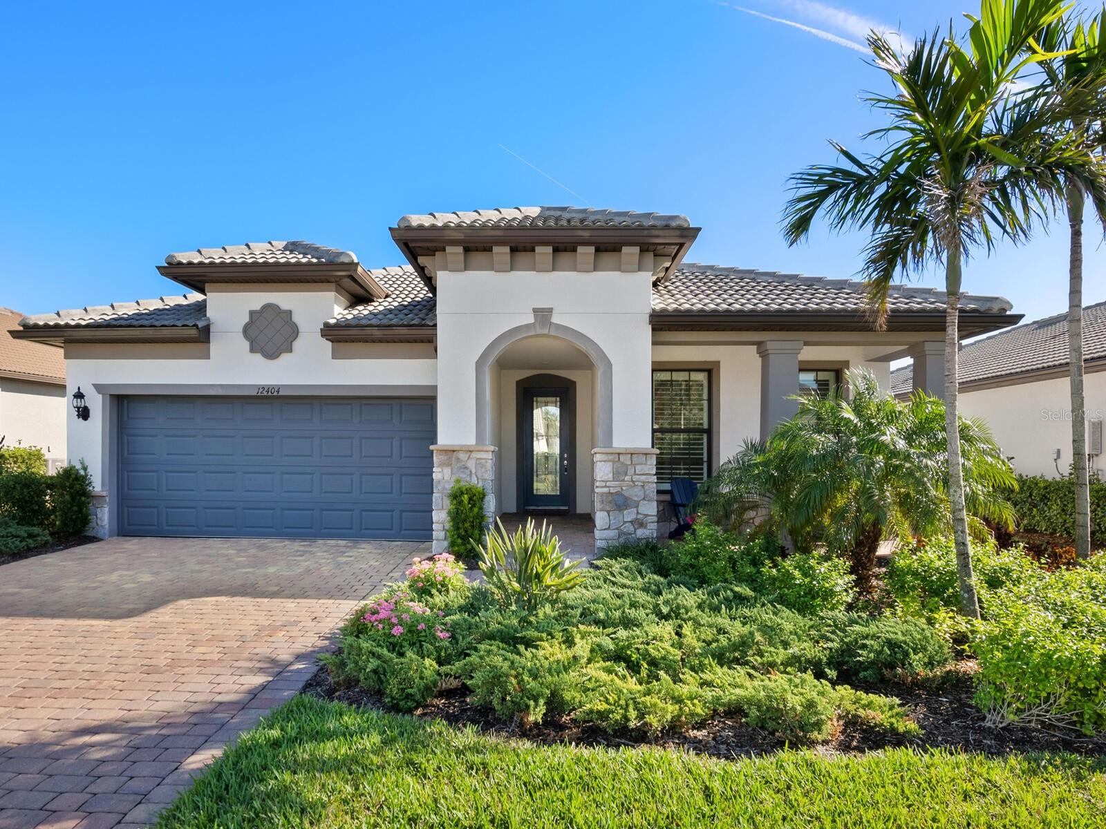 If you love coming home to a crisp, clean and stylish space, this residence is for you! Paired with the fun and active lifestyle at Hammock Preserve on Palmer Ranch, it’s a no-brainer. This MOVE-IN-READY, beautifully FURNISHED masterpiece offers 1,850 square feet, featuring a fabulous primary suite, a grand guest bedroom, a den/office with a queen Murphy bed and two full baths. The great room boasts corner sliding glass doors, seamlessly blending indoor and outdoor living. The owners have added their special touch with elegant crown molding, fresh paint in the bedrooms, and stunning fandeliers in nearly every room. If you’re not familiar with a fandelier, this home is worth seeing just for that. The gourmet kitchen features quartz countertops, a marble backsplash, stainless steel appliances, including a gas cooktop, an eat-in island, filtered water, a large pantry and sensational new light fixtures. The split-bedroom floor plan ensures privacy, with a spacious primary suite offering a walk-in shower, soaking tub, dual sinks, private commode and a large walk-in closet. The guest suite is tucked away at the front of the home with its own bath, while the den/office provides extra guest space if needed. Additional highlights include an oversized laundry room with ample cabinetry and a golf cart space in the garage for extra storage. The screened and covered lanai is the place to enjoy Sarasota’s sunshine, with plenty of space to add a pool. Best of all, this damage-free home is in an X flood zone, offering peace of mind. Hammock Preserve is a standout among Palmer Ranch communities, featuring a clubhouse with indoor and outdoor kitchens, a resort-style pool, a fire pit, dog parks, tennis and pickleball courts, and a dynamic social calendar. Just minutes from Interstate 75, world-famous Siesta Key Beach, and Sarasota’s best shopping and dining, this home is the ideal blend of luxury and convenience.