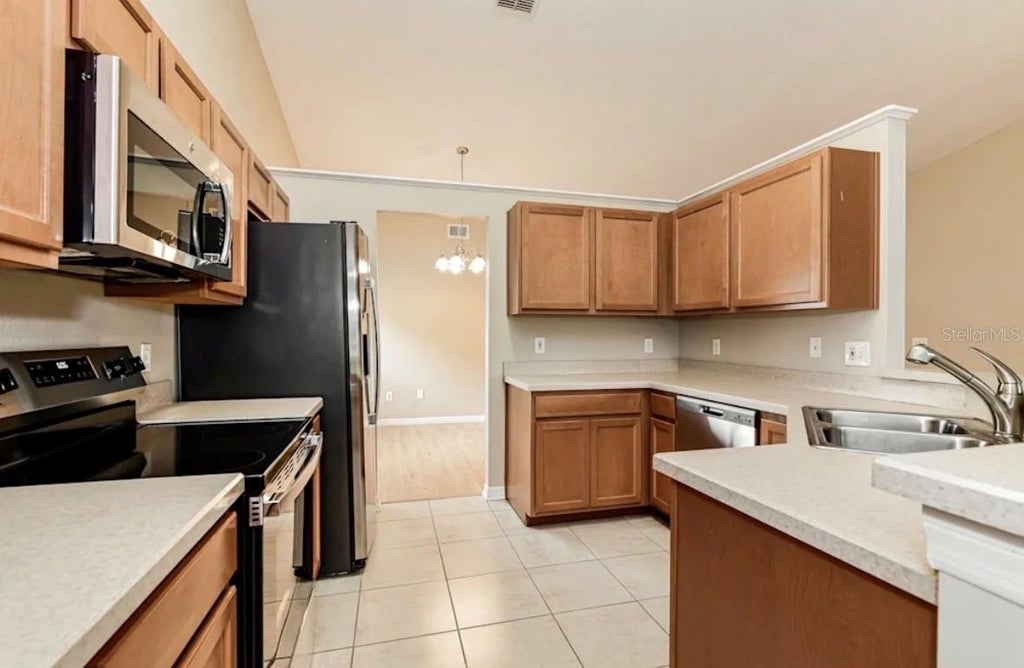 Photo of 12535 Newfield Drive, Orlando, FL 32837 (MLS # TB8548740)