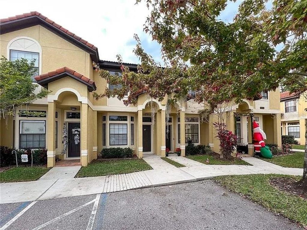 Photo of 6001 Scotchwood Glen #27, Orlando, FL 32822 (MLS # O6366004)