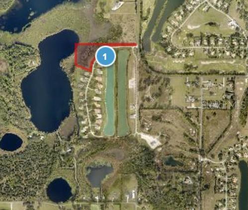 We are pleased to present this Potential Single Family Home Development Site to build several very nice high-end homes. The Buyer will need to do their own engineering and Due Diligence performed for confirmation. Approximately 6.5 (+/-) acres with approximately 3.19(+/-) upland acres zoned for Residential Development. Potential Single Home Development Site to build several homes. The Existing Homes in the Gated Community have 30,000 (+-) SF and are all Million Dollar PLUS Homes..... Gorgeous Community to potentially build some really nice Custom Homes!! The site is located inside the Gated Community but is NOT part of the homeowner’s association where there are 20 Multi-Million Homes. Even though the property is inside the Gated Community of the Homeowner’s Association it is NOT part of the Homeowner’s Association and NOT required to pay any HOA Fees. Super Desirable Location and very Private across from Golf Course and Water Ski Community!!