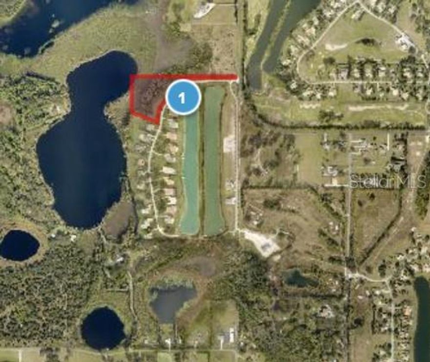 We are pleased to present this Potential Single Family Home Development Site to build several very nice high-end homes. The Buyer will need to do their own engineering and Due Diligence performed for confirmation. Approximately 6.5 (+/-) acres with approximately 3.19(+/-) upland acres zoned for Residential Development. Potential Single Home Development Site to build several homes. The Existing Homes in the Gated Community have 30,000 (+-) SF and are all Million Dollar PLUS Homes..... Gorgeous Community to potentially build some really nice Custom Homes!! The site is located inside the Gated Community but is NOT part of the homeowner’s association where there are 20 Multi-Million Homes. Even though the property is inside the Gated Community of the Homeowner’s Association it is NOT part of the Homeowner’s Association and NOT required to pay any HOA Fees. Super Desirable Location and very Private across from Golf Course and Water Ski Community!!