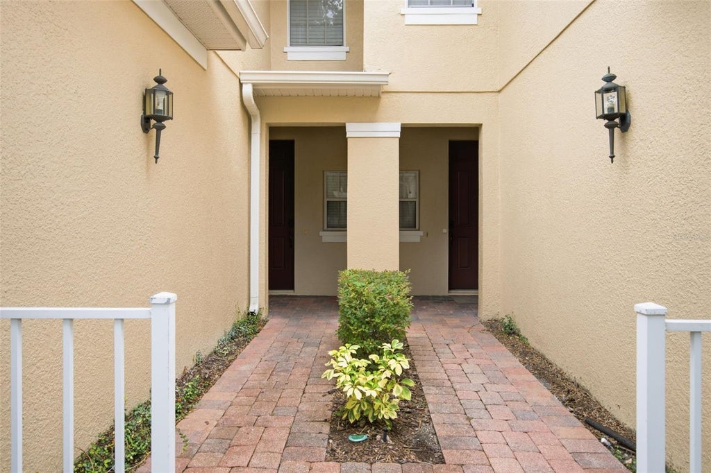 Photo of 5957 Strada Capri Way, Orlando, FL 32835 (MLS # O6437894)