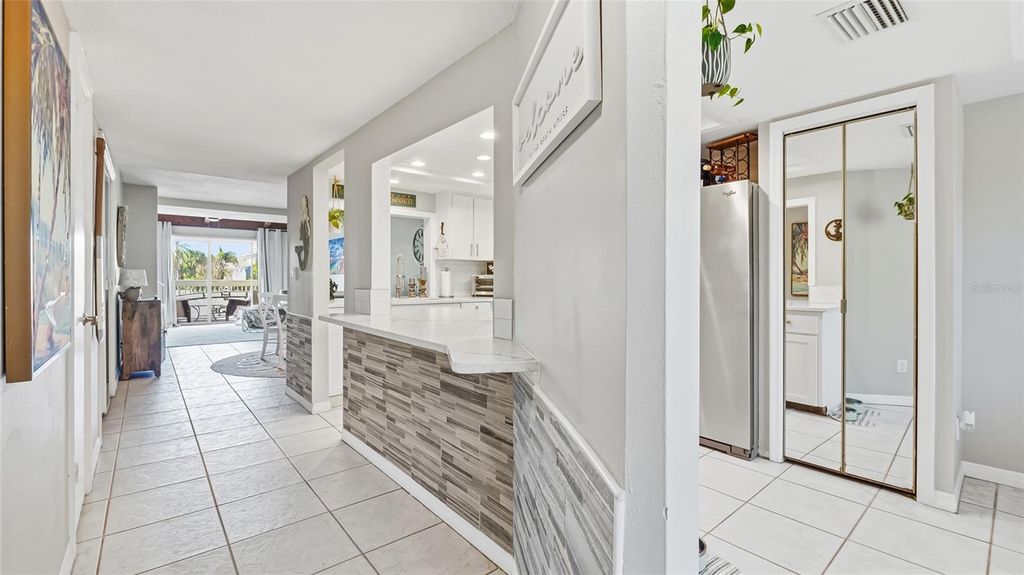 Photo of 318 Windrush Boulevard #9, Indian Rocks Beach, FL 33785 (MLS # TB8423664)