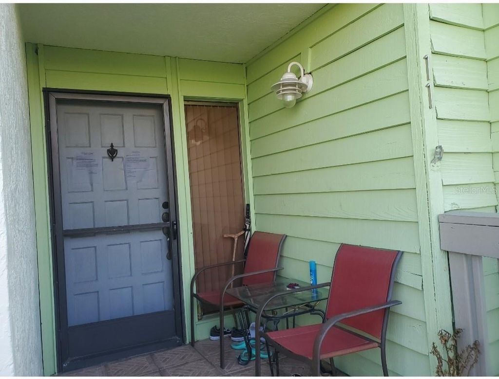 Photo of 318 Windrush Boulevard #9, Indian Rocks Beach, FL 33785 (MLS # TB8423664)