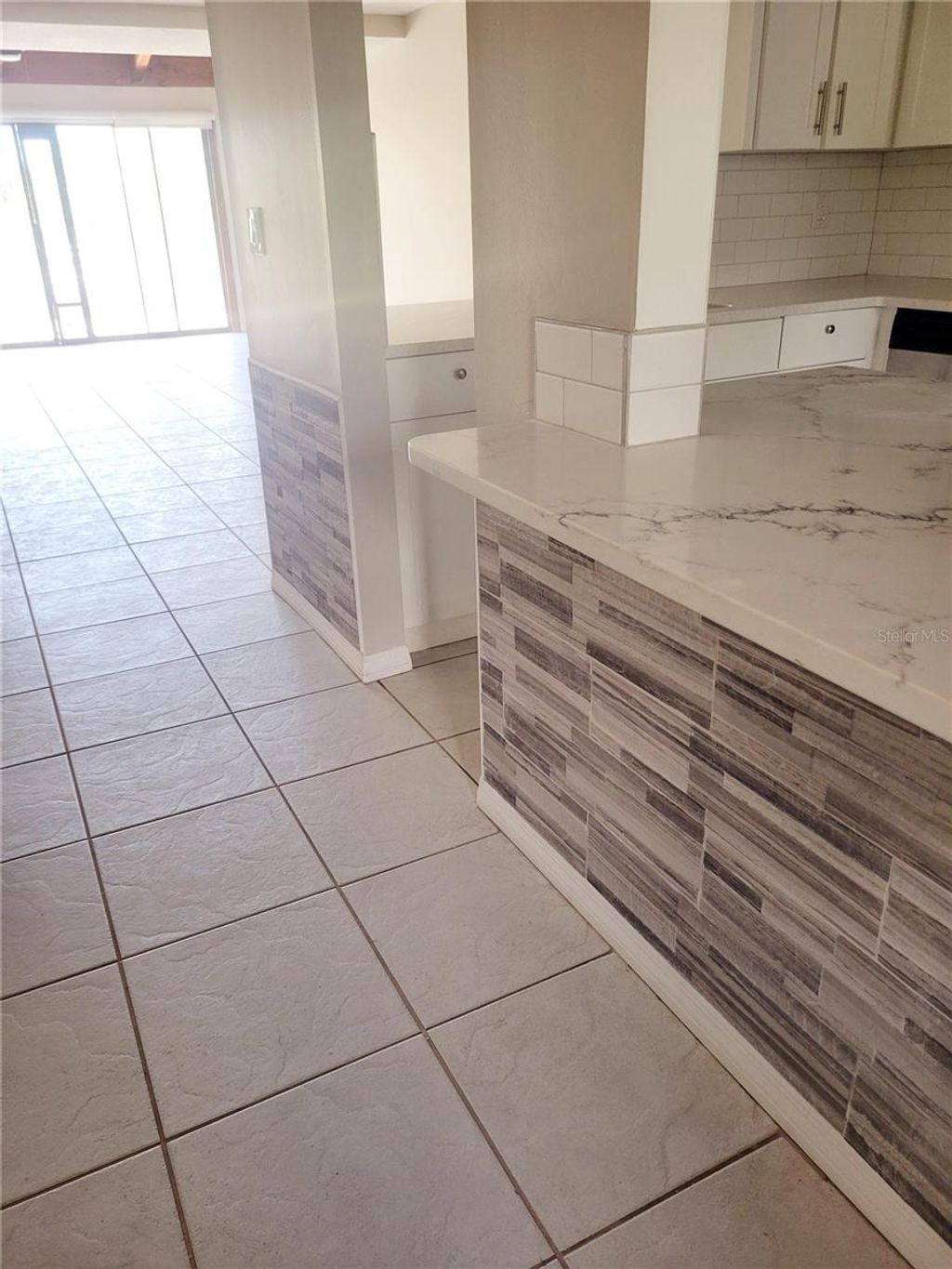 Photo of 318 Windrush Boulevard #9, Indian Rocks Beach, FL 33785 (MLS # TB8423664)