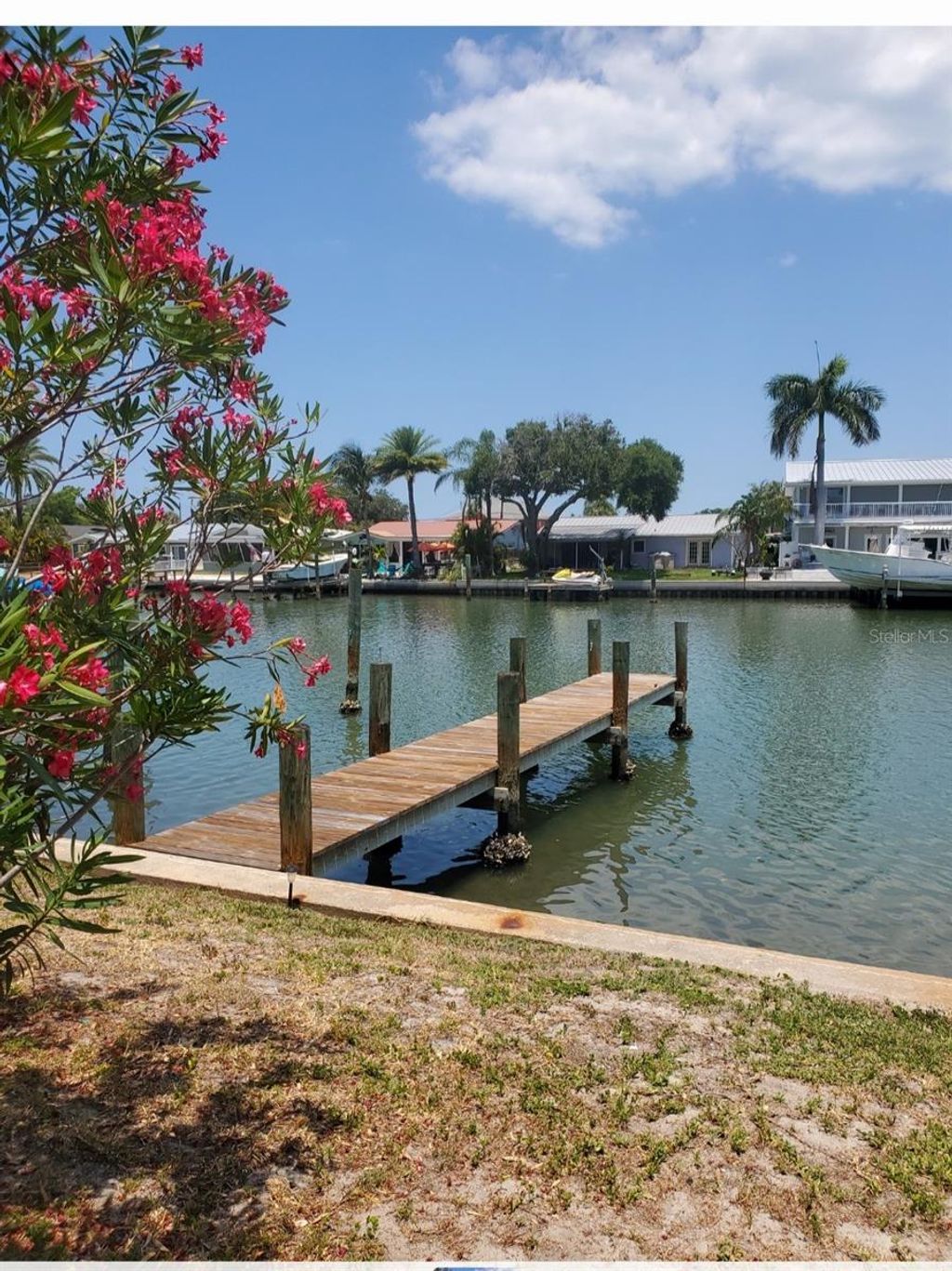 Photo of 318 Windrush Boulevard #9, Indian Rocks Beach, FL 33785 (MLS # TB8423664)