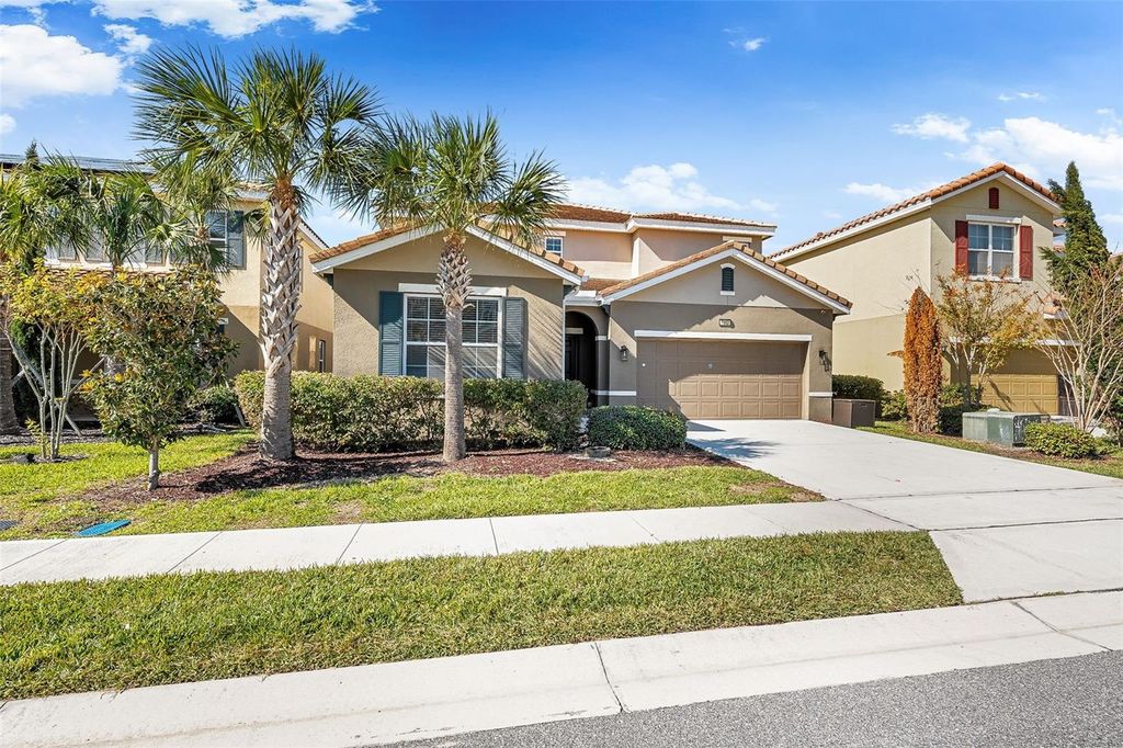 Photo of 7552 Oakmoss Loop, Davenport, FL 33837 (MLS # O6382791)