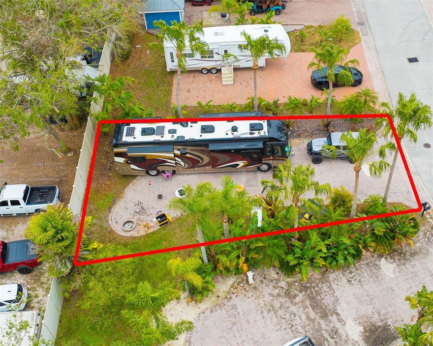 Last Chance to Own in This Premier Clothing-Optional RV Community! Developer Closeout
Located at 6865 Amanda Vista Circle in Land O’ Lakes, Florida, this spacious 80’x40’ RV lot offers the perfect opportunity to embrace the ultimate Florida lifestyle in a clothing-optional, gated RV community. As part of the developer’s closeout, this is your final chance to own in this sought-after community, offering privacy, luxury, and unmatched amenities.
The lot is beautifully designed with brick pavers and surrounded by lush tropical landscaping with palm trees, creating an inviting and serene environment for relaxation or entertaining. This lot has a 100 amp full hookup and Verizon fiber optic is available at the street.  Enjoy the community’s resort-style amenities, including a clubhouse with two pools, a hot tub, tiki bar, and dog park—everything you need to unwind and socialize in a vibrant, welcoming atmosphere.
Located next door to Caliente Resort and close to other clothing-optional lifestyle destinations, this lot offers a unique lifestyle and an ideal location. Caliente is just a golf cart drive away and offers a variety of membership options.  In addition, you’ll be conveniently close to golf courses, shopping, dining, and the airport, ensuring that you have everything you need just minutes away.
With the developer’s closeout now underway, this is your last opportunity to secure a premium lot in this exclusive community.