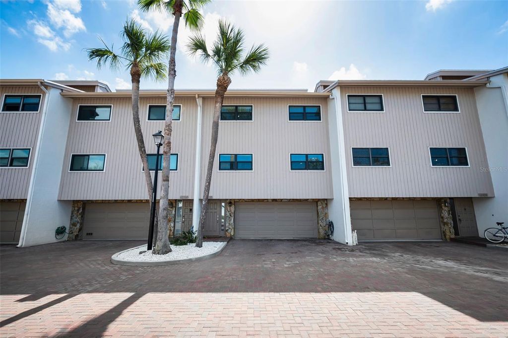 Photo of 12334 Capri Circle N, Treasure Island, FL 33706 (MLS # TB8484254)