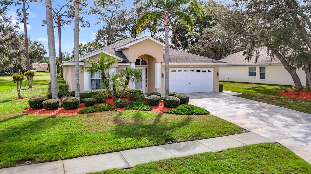 Photo of 13510 Knotty Lane, Hudson, FL 34669 (MLS # W7889494)