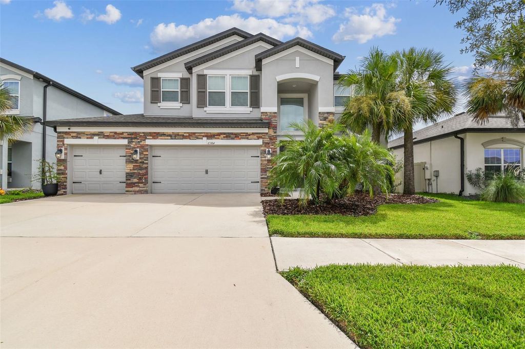 Photo of 6584 Dutton Drive, Wesley Chapel, FL 33545 (MLS # TB8422501)