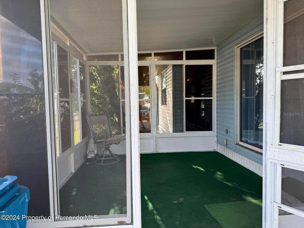 Photo of 7411 Fairlane Avenue, Brooksville, FL 34613 (MLS # TB8495225)