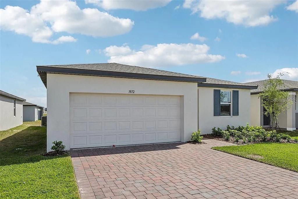 Location meets affordability and comfortability!
This brand-new, energy-efficient home features 3 spacious bedrooms, 2 full bathrooms, and a versatile flex room is perfect for a home office, formal dining, playroom, or creative space. Located in a desirable Winter Haven community just minutes from Legoland, shopping, dining, and with easy access to the Chain of Lakes, Lakeland, Tampa, and Orlando.
Step inside to an inviting open-concept layout where the kitchen seamlessly connects to the dining area, great room, and outdoor patio—ideal for entertaining or relaxing. The private primary suite offers a spacious retreat to unwind after a long day.
Villamar residents enjoy access to two resort-style amenity centers complete with a clubhouse, swimming pool, and playground. Winter Haven is famous for its stunning Chain of Lakes, lakeside restaurants, and award-winning community theater. Nearby attractions include Legoland Florida and the Peppa Pig Theme Park.
With cutting-edge, energy-efficient features designed for comfort, savings, and peace of mind, this home is a must-see. Don't miss your chance to make this your new home!