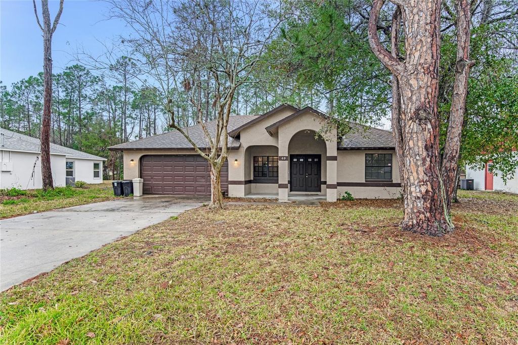 Photo of 49 Braddock Lane, Palm Coast, FL 32137 (MLS # FC316575)