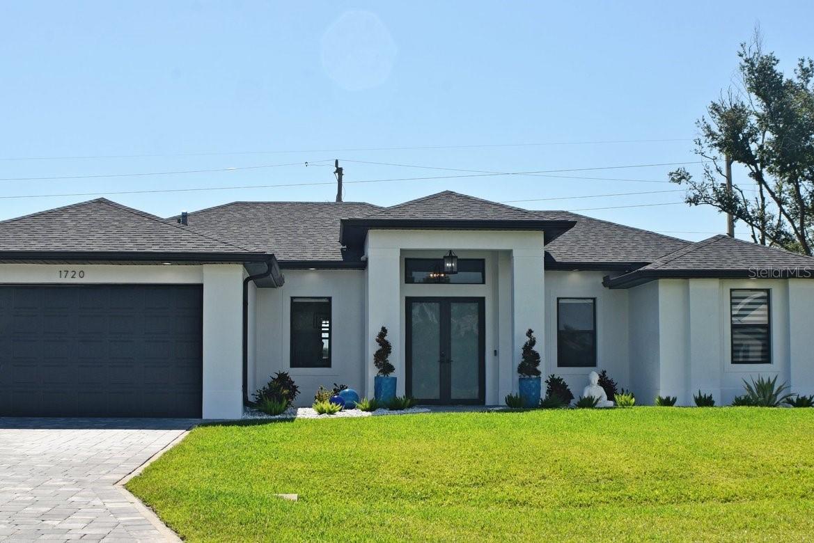 Welcome to your dream vacation in SW Cape Coral! This stunning single family home boasts 3 bedrooms, 2 bathrooms, and a plethora of luxurious amenities. Imagine relaxing in your in-ground pool with spa, or cooking gourmet meals in your kitchen with granite counters and stainless steel appliances. The tile flooring adds a touch of elegance, while the heated pool ensures year-round enjoyment. The privacy fencing in the backyard is perfect for entertaining or simply unwinding in peace. Small dog(s) are also welcome to enjoy the spacious yard, while you relax in the hammock, 2 person egg swing or just soak up the sun on the beautiful sun shelf in the pool. Don't miss out on this incredible opportunity to vacation in this "one of a kind" slice of paradise and book your next vacation today!