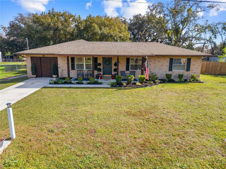 OVER ½ ACRE with NO HOA!

Straight from the pages of Architectural Digest, this stunning, updated 3-bedroom, 2-bath home is designed to impress. Recent upgrades include a NEW ARCHEITECTURAL ROOF (2021), UPDATED GOURMET KITCHEN (2021), PRIMARY BATHROOM (2019), 2ND BATHROOM (2025), WATER HEATER (2022), and SIDE PRIVACY FENCE (2024).

From the moment you arrive, you’ll be captivated by the charming stone pathway leading to the inviting front sitting porch—the perfect spot to enjoy your morning coffee. The front entry opens to a formal living room with vaulted ceilings, creating a bright and welcoming first impression.

The heart of the home is the beautifully refreshed designer kitchen, featuring refurbished cabinetry, updated countertops and hardware. The spacious island is ideal for entertaining. Stainless-steel appliances included with French door refrigerator. The farmhouse sink has a view into the dining area. Thoughtful designer touches and updated lighting flow throughout the home.

Natural light fills the expansive 20x30 family and dining room, showcasing wood floors and a stone, wood-burning fireplace, making it perfect for gatherings. A wet bar with a tiled accent area adds to the home’s entertainment appeal.

Down the hall, the primary suite overlooks the backyard and features an ensuite bath with a stylish vanity, lighting, flooring, and a glass-enclosed shower. The second and third bedrooms share an updated second bathroom with a new vanity, mirror, and lighting.

The home features a dedicated 14x12 laundry room with washer and dryer included, plus an additional storage room conveniently located off the laundry area, offering excellent flexibility and organization space. 

Enjoy Florida living at its finest on the wrap-around covered and screened patio, ideal for family dinners or peaceful evenings. The expansive backyard is fully fenced with a combination of privacy fencing and chain-link fencing, and includes a chicken coop, a firepit with ample seating, and plenty of room to add a pool or create the garden of your dreams—the possibilities are endless.

Ideally located just 11 miles from Disney, 23 miles from Orlando International Airport, and 9 miles to Downtown Kissimmee, this up-and-coming community offers peaceful rural living with room to roam, all while remaining close to major attractions.

Move-in ready, no HOA, and truly one of a kind. Schedule your private showing today!