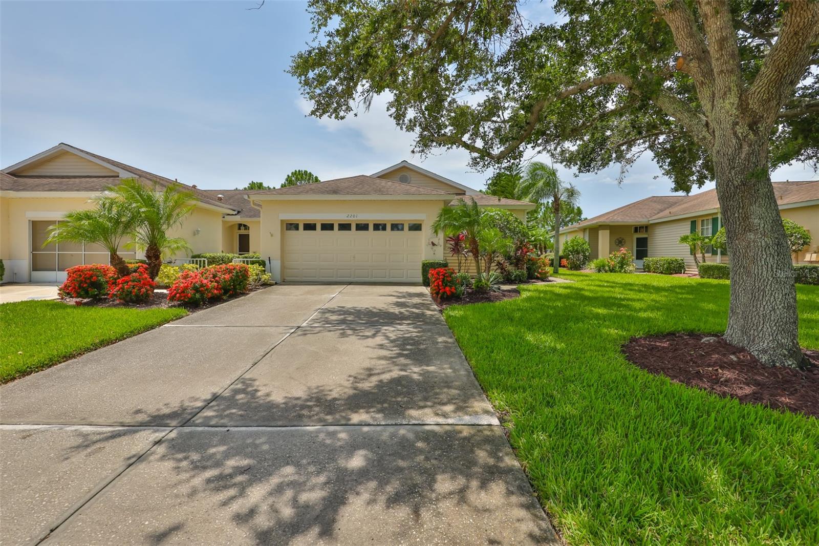 Welcome to carefree living in the heart of Sun City Center! This beautifully maintained 2-bedroom, 2-bath Kings Point villa is nestled on a quiet lot and offers a perfect blend of comfort and convenience. Step inside to find an inviting open floor plan with an abundance of natural light, neutral tile flooring, and spacious living and dining areas—ideal for entertaining or relaxing. The updated kitchen features solid surface countertops, ample cabinetry, a breakfast bar, and a cozy dinette space. The large master suite includes a walk-in closet and a private en-suite bathroom with a step-in shower. A split floor plan provides added privacy for guests with a comfortable second bedroom and full guest bath. Enjoy your morning coffee or evening breezes in the enclosed Lanai, offering serene golf course views and additional space for lounging or hobbies.
Located in the highly sought-after gated 55+ Kings Point community, residents enjoy world-class amenities including clubhouses, pools, fitness centers, golf, tennis, pickleball, and endless social clubs and events. HOA covers exterior maintenance, water, sewer, cable, and more—perfect for seasonal or full-time living.
Don’t miss this chance to own a piece of Florida paradise with new A/C, recent plumbing upgrades, and new lighting features—schedule your private showing today!