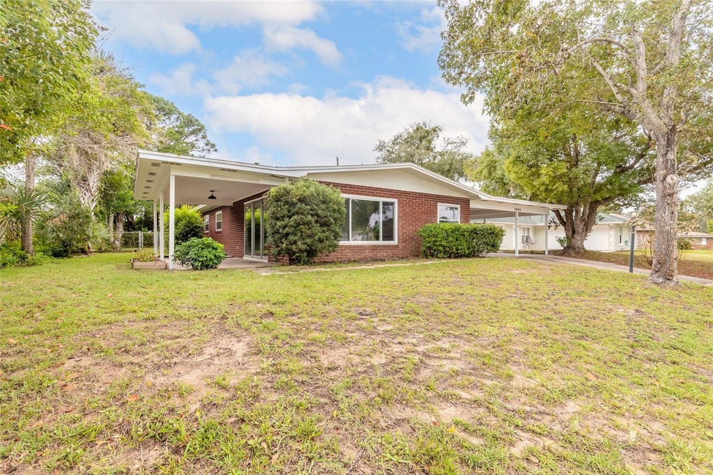 Photo of 14 Lee Drive, Edgewater, FL 32141 (MLS # NS1089462)