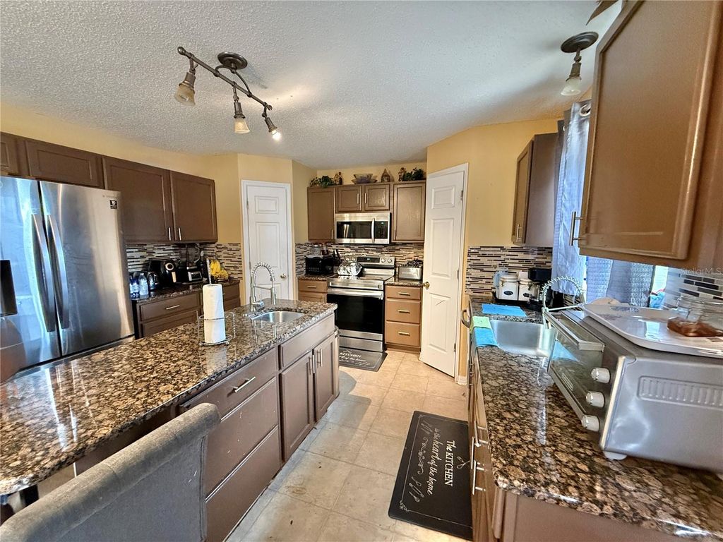 Photo of 1804 Emily Drive, Winter Haven, FL 33884 (MLS # O6370003)