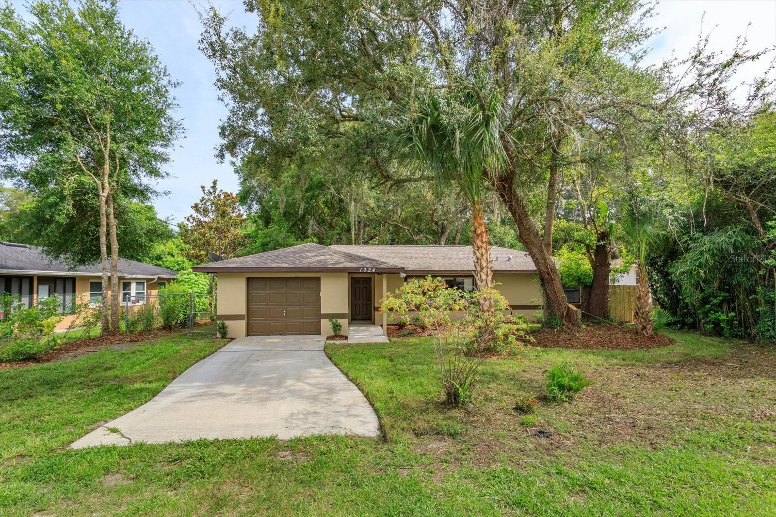 Completely Remodeled & Move-In Ready!
Welcome to this modern and stylish home at 1324 16th Street in the heart of Orange City. Priced under $250K, this beautifully updated property offers incredible value for first-time homebuyers or investors looking to expand their rental portfolio.
Step inside to discover this fully renovated (2025) home with gorgeous wood-look tile floors, sleek modern light fixtures, and an open, inviting layout filled with natural Florida sunshine streaming through an abundance of windows. Every inch of this home has been thoughtfully updated to blend comfort and style. With a 2023 roof, you don't have to worry about a thing! Great size bedrooms, the primary has a walk in closet, spacious family room and dining room off of the kitchen & plenty of counter and cabinet space in the updated kitchen.
Outside, the home truly shines with a generously sized, tree-lined backyard that’s both shaded and private—perfect for relaxing or entertaining. Enjoy the covered, screened-in patio for year-round comfort, plus an open wood deck ideal for grilling out or soaking up the sun. With so much space, the possibilities for outdoor living, gardening, simply enjoying the quiet surroundings or even adding future features are endless.
The functional floor plan makes daily living and entertaining easy, while the central Orange City location keeps you close to shops, dining, and major roadways. Homes this turn-key and affordable are rare—don’t miss your chance to make this one yours!