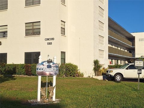 Photo of 5969 Terrace Park Dr Drive N #203, St Petersburg, FL 33709 (MLS # TB8462232)