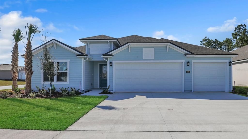 Photo of 36 Lumber Jack Trail, Palm Coast, FL 32137 (MLS # FC295581)