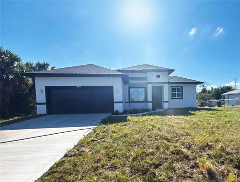 Photo of 18097 Cochran Boulevard, Port Charlotte, FL 33948 (MLS # O6362149)