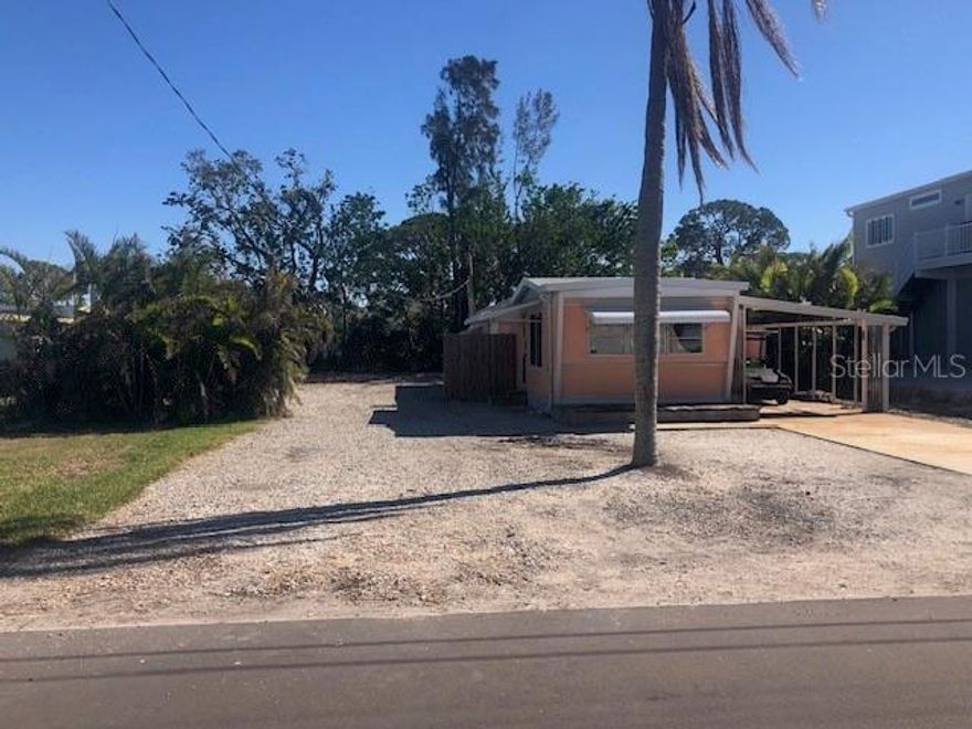 Water view, water access and no HOA - it doesn't get much better than that.     This is a  75 x 130 ft lot with deeded water access to Sarasota Bay. \  The ramp is close to Longboat Pass for easy access (10 min) to the Gulf.  Close to Cortez Village and the sandy beaches of Anna Maria Island.    This location would be an ideal property to develop into your Florida dream home, vacation destination or income property.  Come by and take a look!