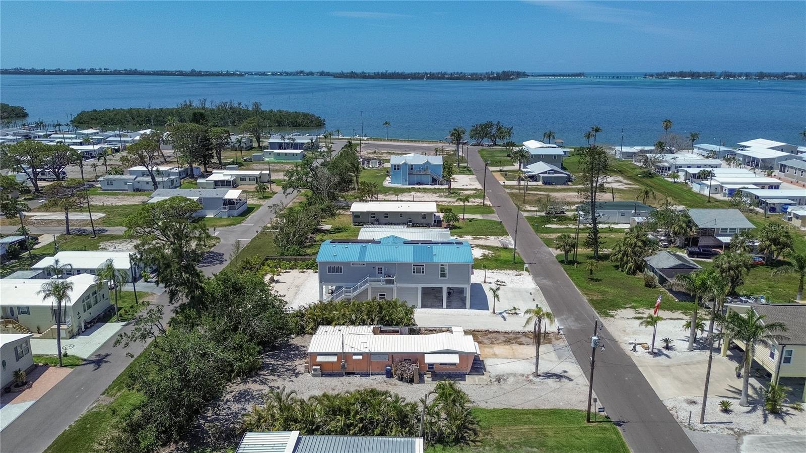 Water view, water access and no HOA - it doesn't get much better than that. This is a 75 x 130 ft lot with deeded water access to Sarasota Bay with a private boat ramp at the end of the block. The ramp is close to Longboat Pass for easy access to the Gulf. Close to Cortez Village and just 2.3 miles to the sandy beaches of Anna Maria Island. It has a structure on it currently that needs to be removed. Landscaped for privacy. This location would be an ideal property to develop into your dream home, vacation destination or income property. Come by and take a look!