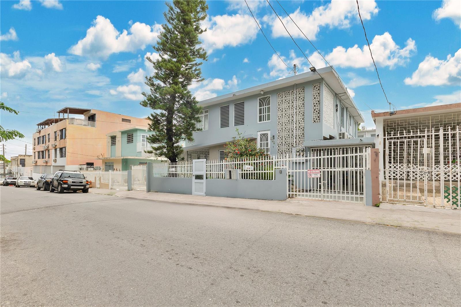 Prime San Juan Multi-Family Property in Santurce – Perfect for Airbnb! This fully furnished property features 4 units with a total of 9 bedrooms and 5 bathrooms. Two spacious units are at the front, and two additional units are at the back. It’s conveniently located near the train, close to the beach, and in the Condado area, a popular tourist destination. Additionally, the property is close to the University of Sagrado Corazón, hospitals, shopping centers, and is just 6 miles from the airport. It is also just 7 miles from the Old San Juan area. The property is situated in a vibrant tourist area, making it an excellent investment opportunity. The property also has separate power meters for each unit. Currently, it is being rented as a short-term rental and is fully operational in that area. Call us to contact us for more information.